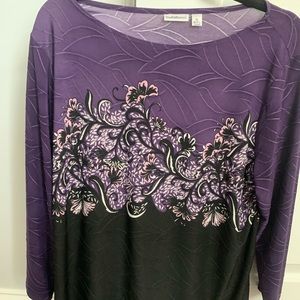 Slinky material gently used shirt